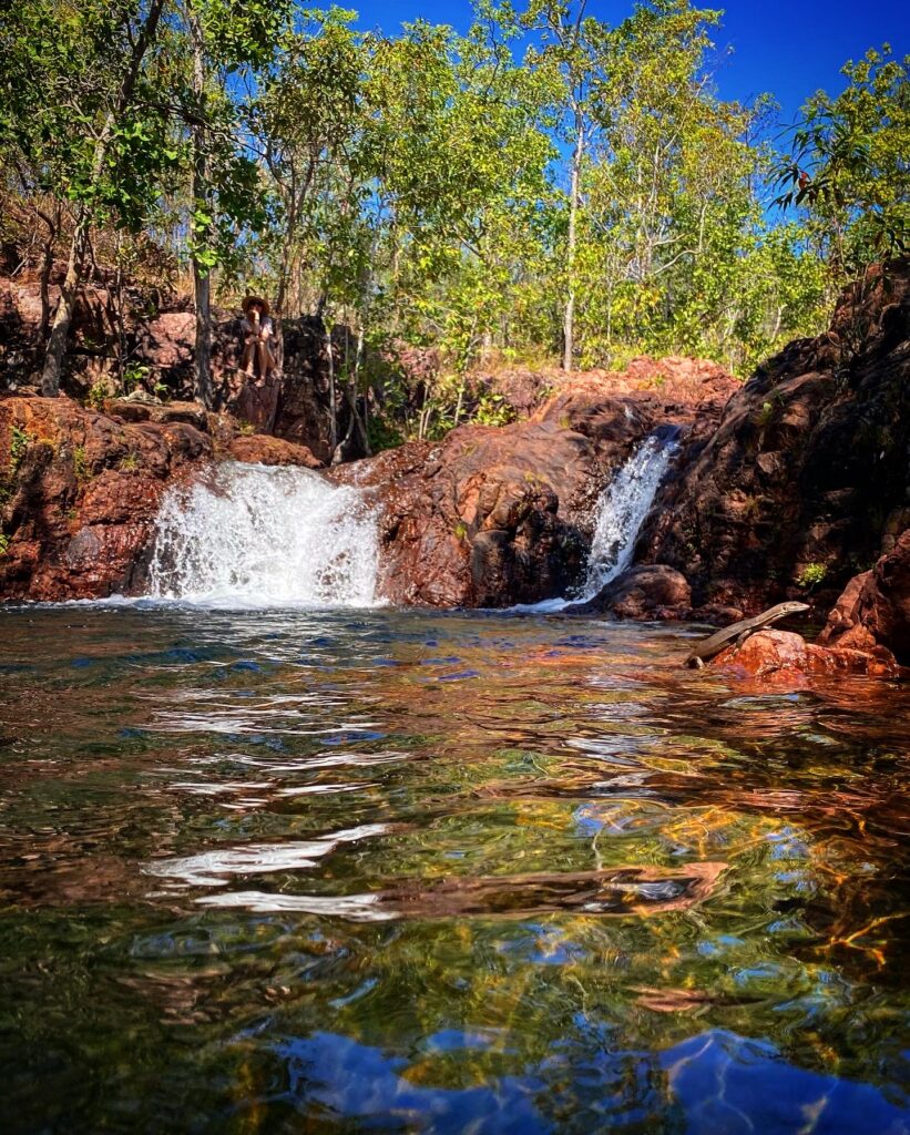 Natural rock pool next to two small waterfalls at the Lower Cascades in Litchfield National PArk