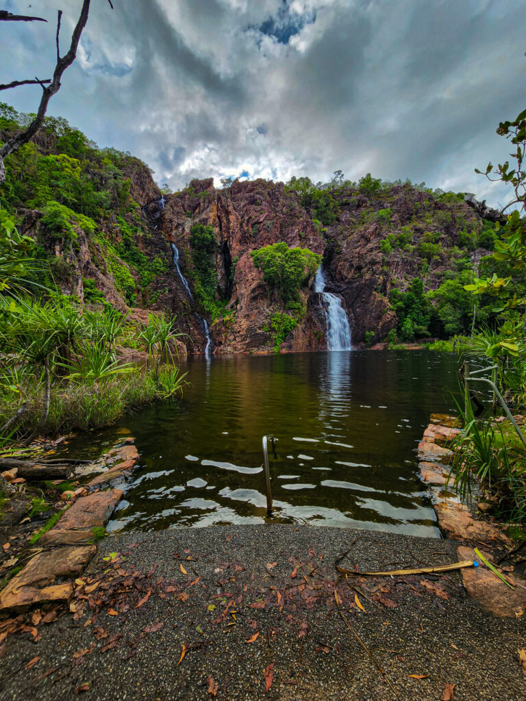 wangi falls at litchfield national park on a cloudy day with no swimmers