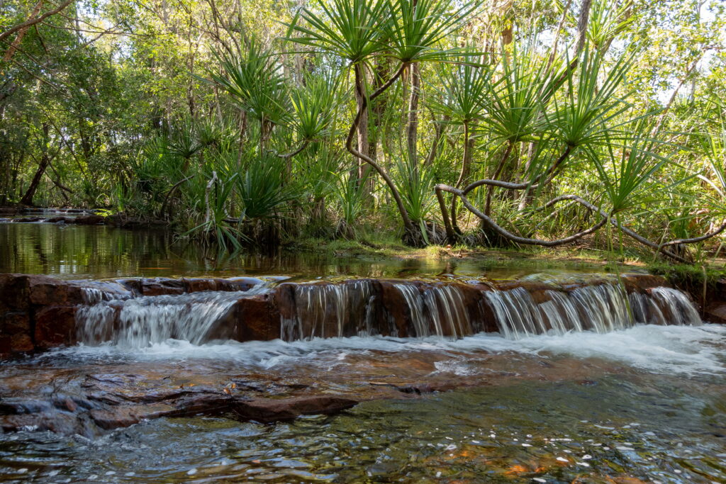 waterfalls cascading along tabletop trek in Litchfield National Park